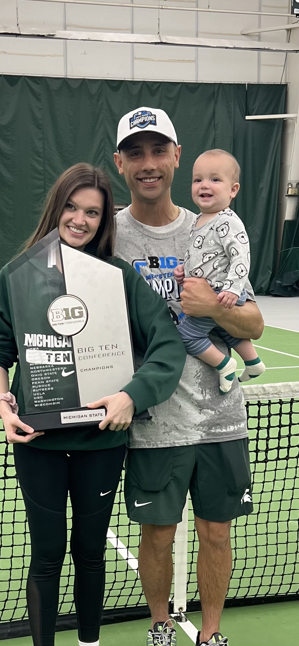 Harry with his wife Rachel and son Rami celebrating a Big Ten tennis championship